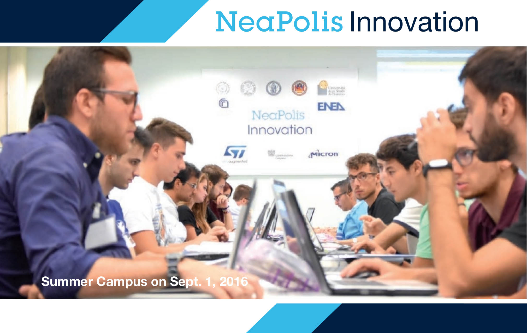 immagine di studenti seduti al tavolo davanti a computers tratta dall'edizione 2016 del summer campus